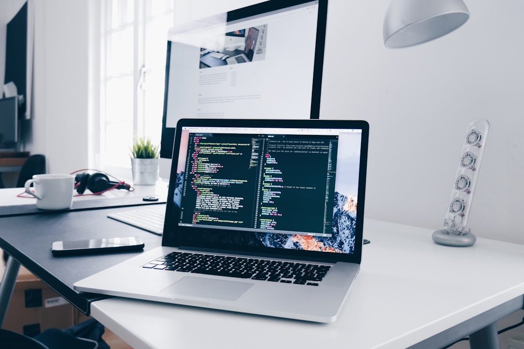 Developer building Angular components on a laptop